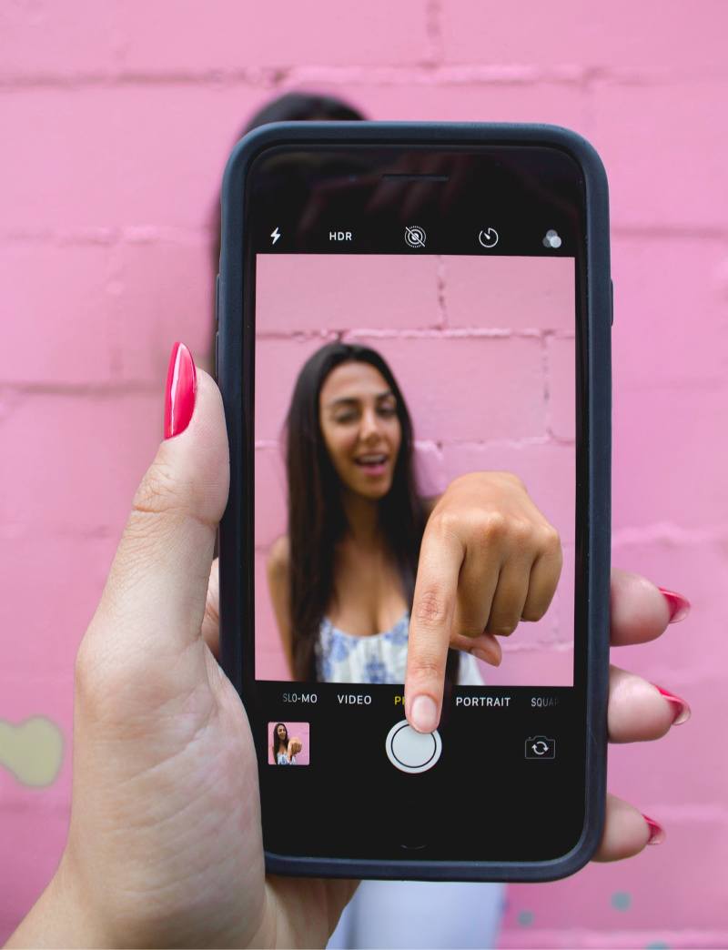 photo-of-person-holding-iphone-optimized